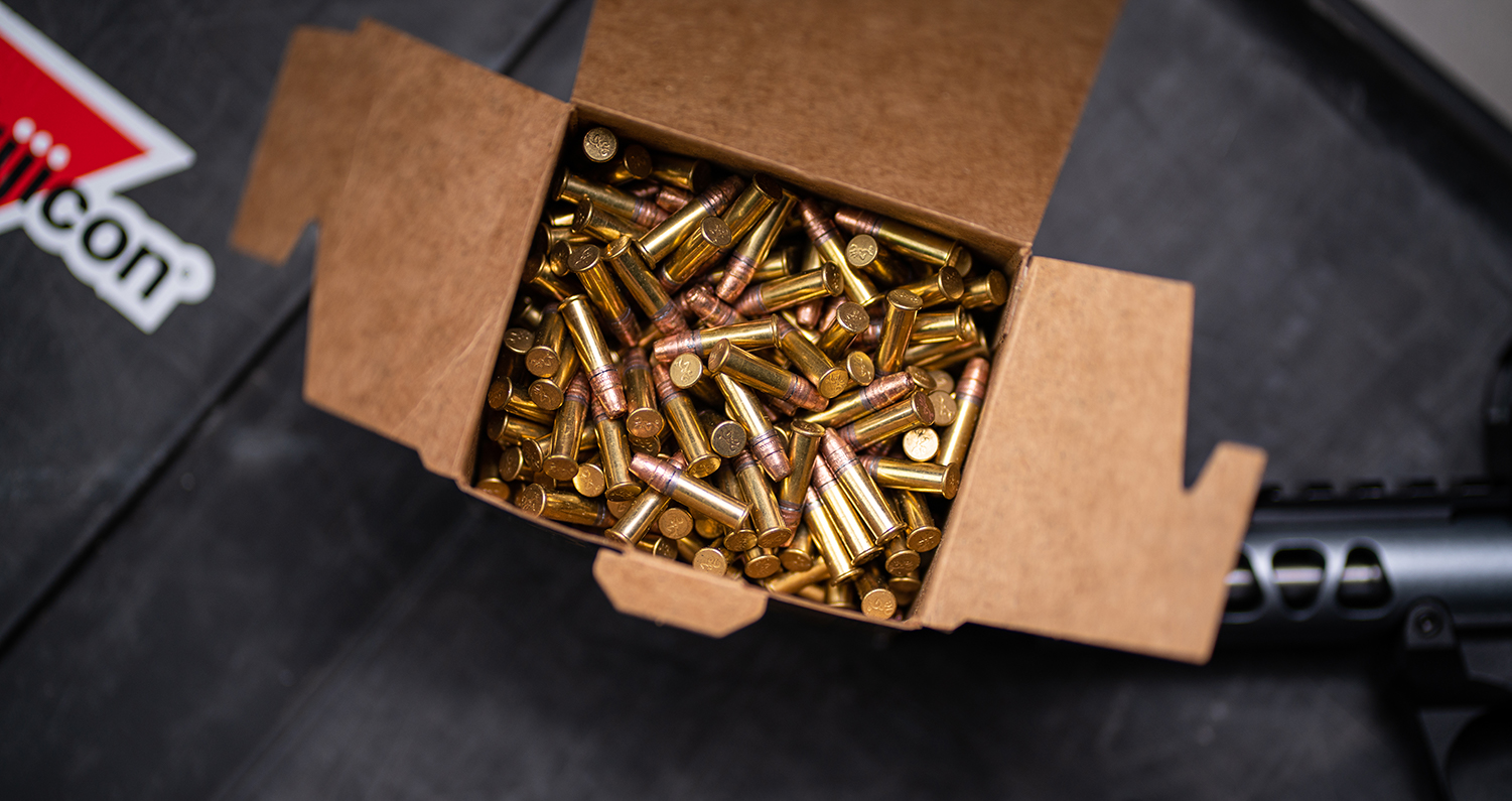 Box of 22lr ammo with a ruger pistol