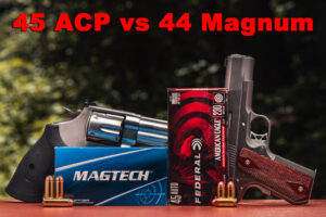 45 ACP vs 44 Magnum ammo and handguns on display at a shooting range