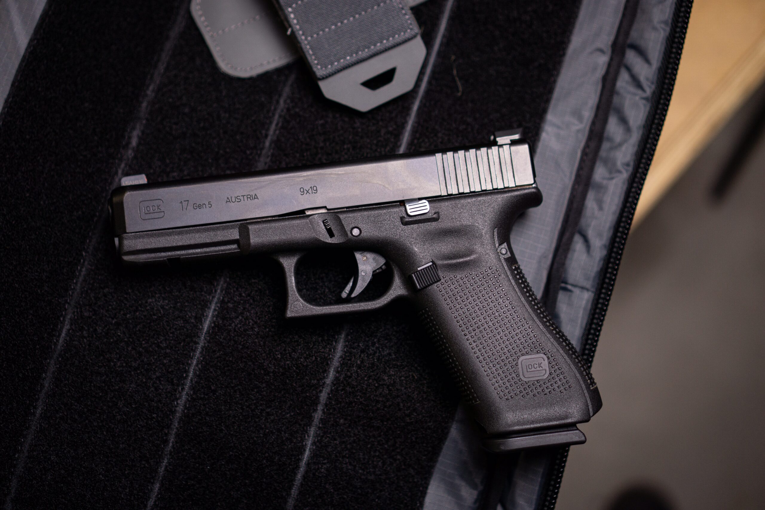 Glock 17 Gen-5 pistol on a bench