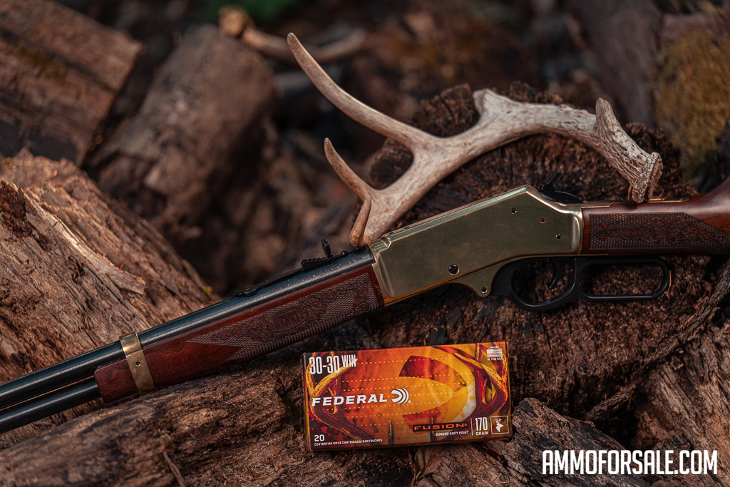 30-30 Winchester lever action rifle and ammo with antlers