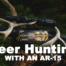 Deer antlers with 223 ammo and an ArR-15 displayed in the woods