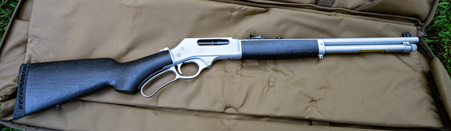 A lever action long gun made by Henry