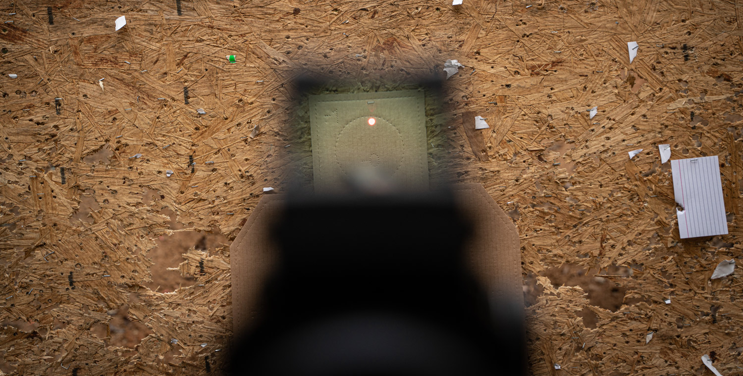 Looking through a red dot reticle down range