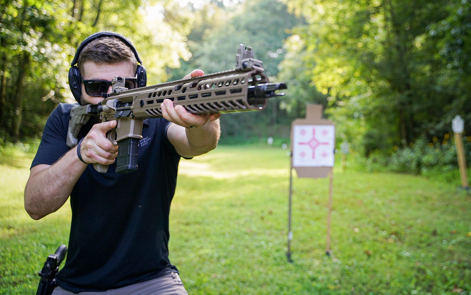 Shooting a 300 Blackout rifle at a shooting range