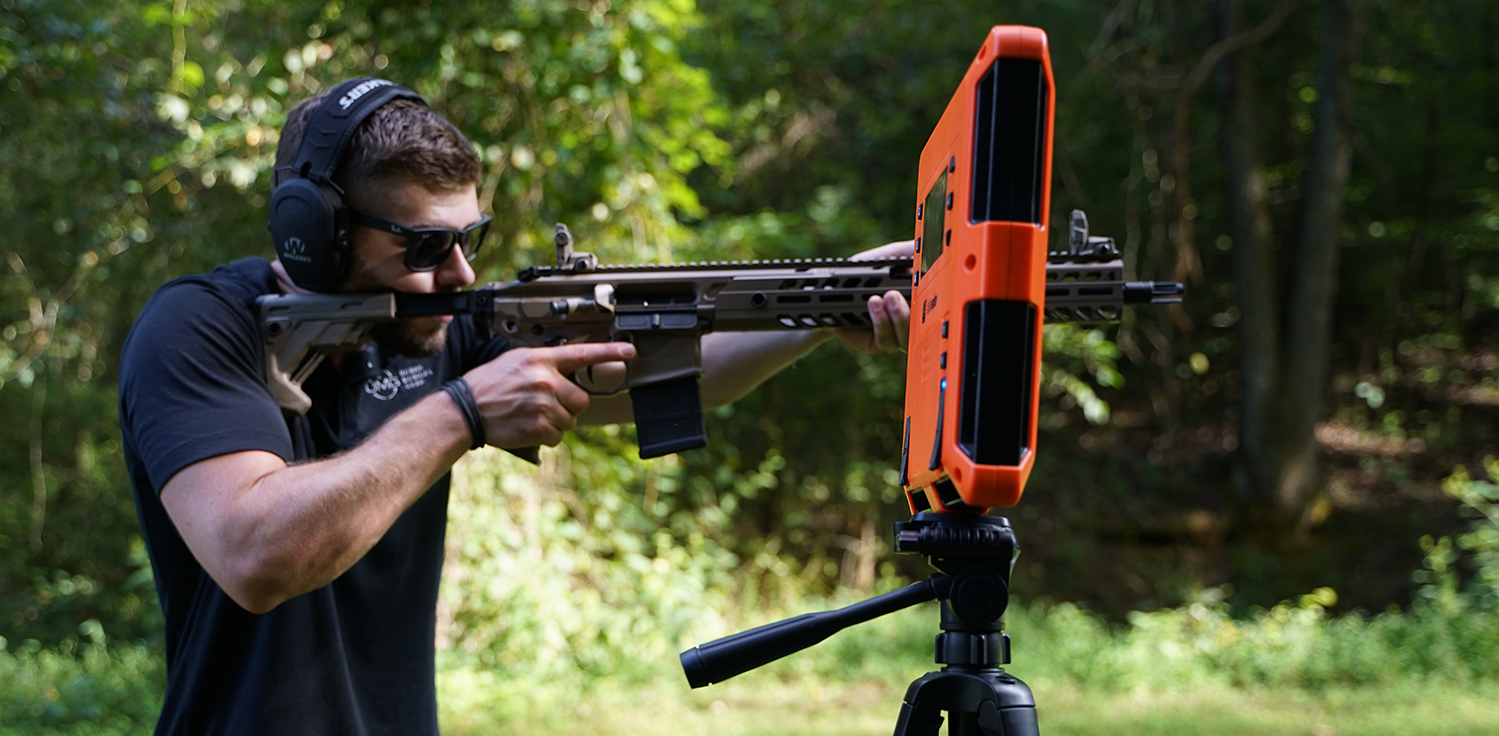 Shooting a 300 blackout rifle at a shooting range