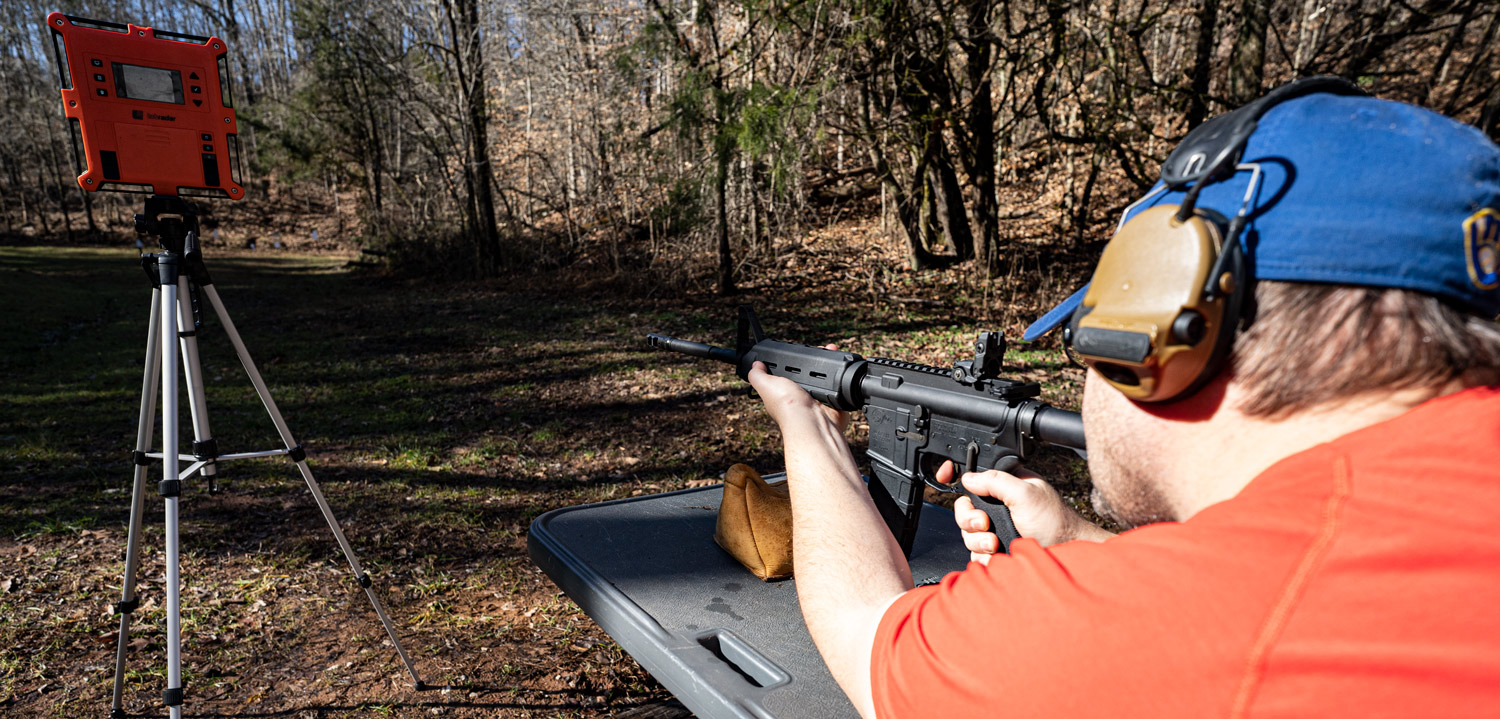 Measuring 5.56 velocity with a chronograph at a shooting range with an AR-15