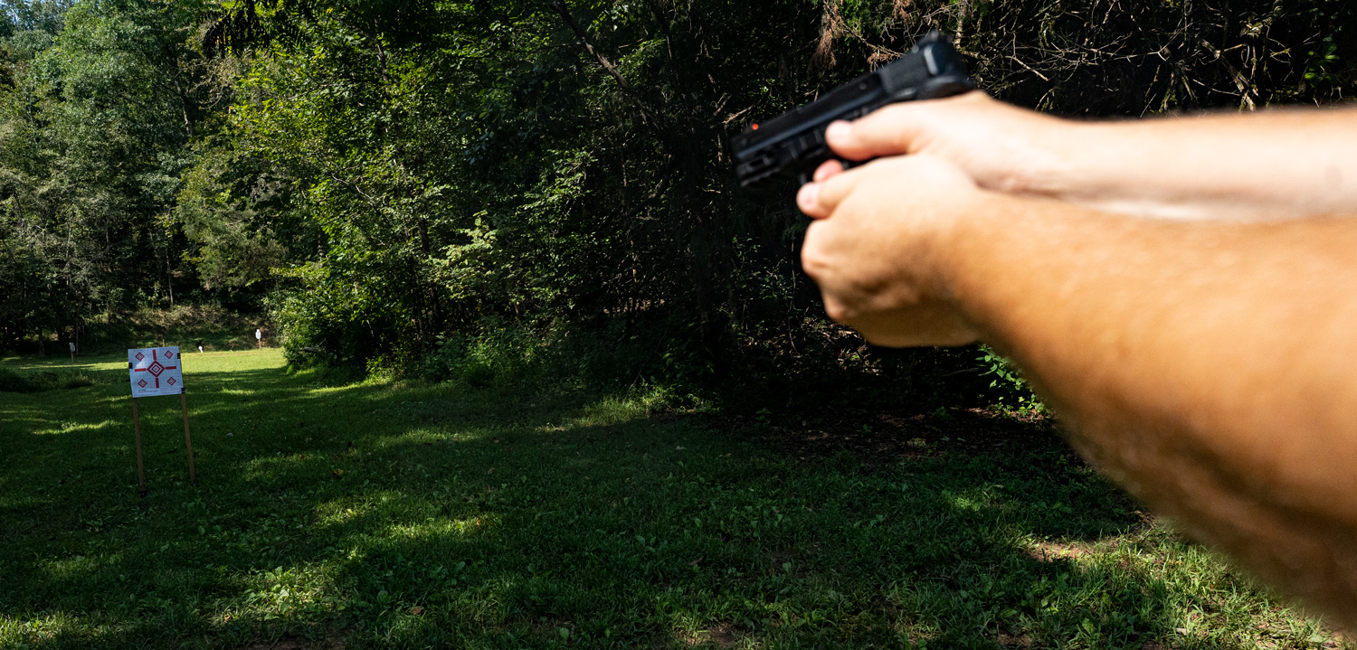 Shooting a smith & Wesson 380 EZ pistol at the range