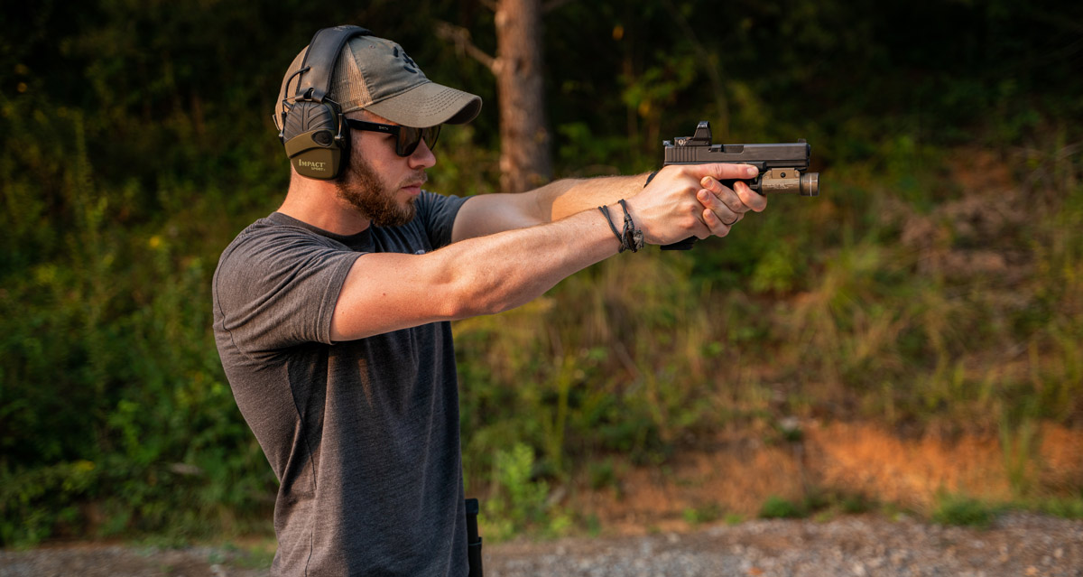 Shooting a Glock 9mm pistol at the shooting range