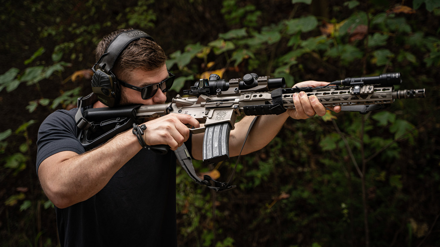 The author shooting targets with a scope