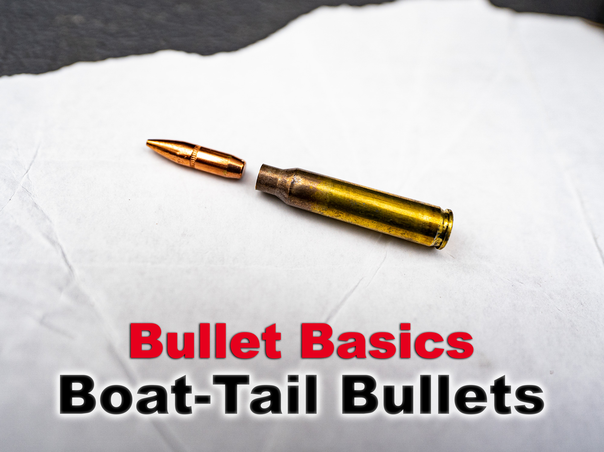 boat tail bullet displayed on a target at a range